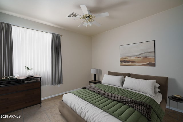 10618 W Pima St, Tolleson, AZ 85353 - bedroom with light tile patterned flooring and a ceiling fan