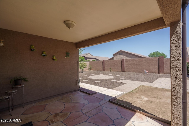 10618 W Pima St, Tolleson, AZ 85353 - fenced backyard featuring a patio area
