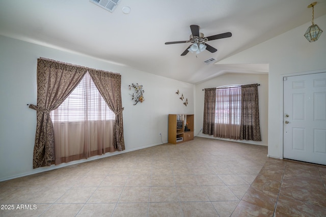 10618 W Pima St, Tolleson, AZ 85353 - unfurnished living room with lofted ceiling, a ceiling fan, and tile patterned floors