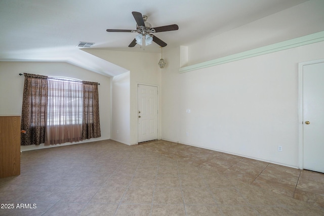 10618 W Pima St, Tolleson, AZ 85353 - tiled spare room featuring vaulted ceiling and ceiling fan