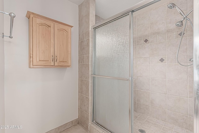 bathroom with a shower stall