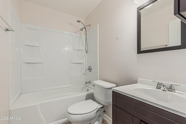 bathroom featuring toilet, vanity, and shower / bathing tub combination