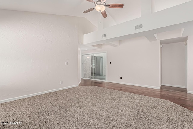 empty room with visible vents, ceiling fan, carpet floors, and baseboards
