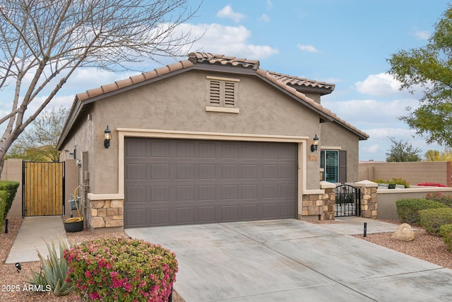 view of front of home with a garage