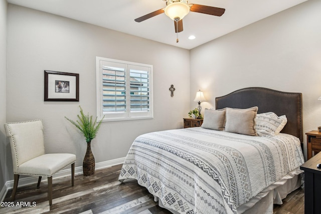 bedroom featuring ceiling fan and dark hardwood / wood-style flooring