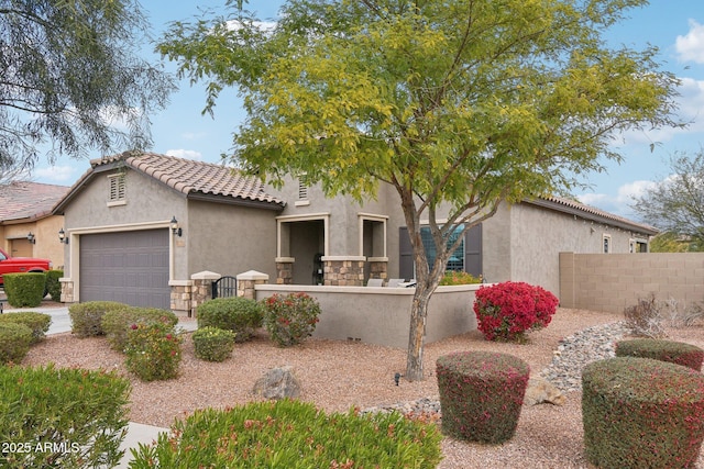 view of front of property with a garage