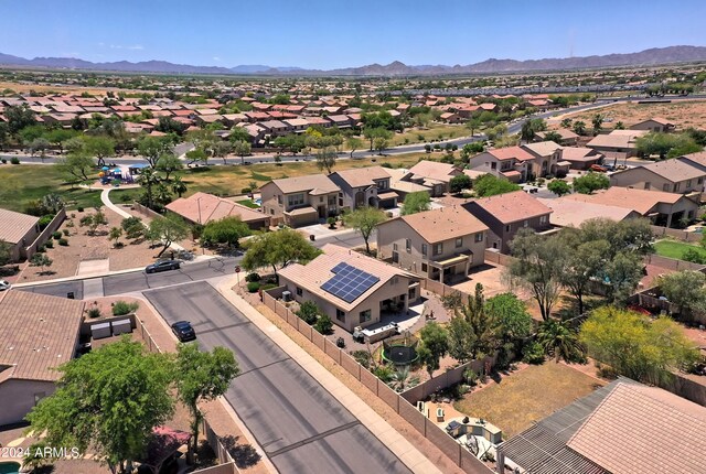 birds eye view of property featuring a mountain view