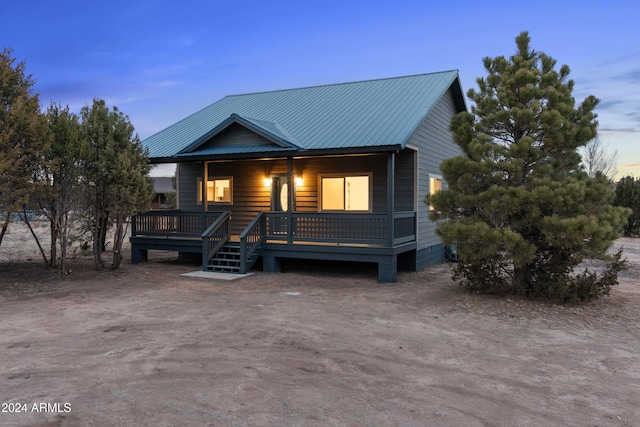 view of front of property featuring a deck