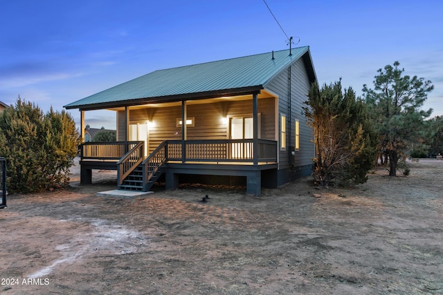 view of front facade featuring a wooden deck