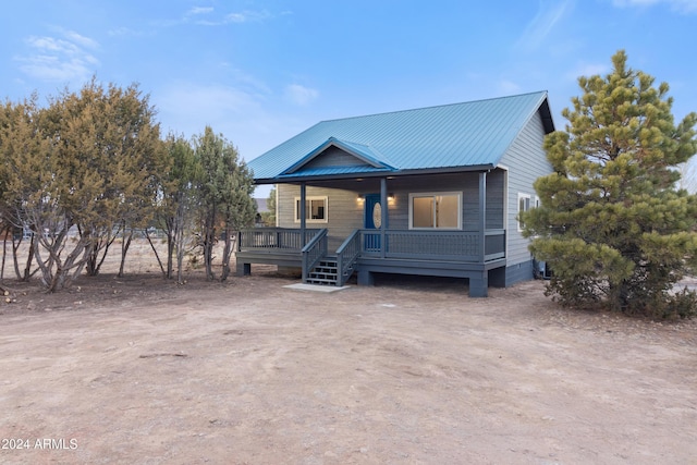 view of front of property featuring covered porch