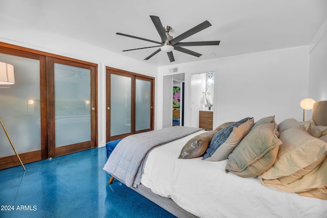 bedroom featuring ceiling fan and connected bathroom