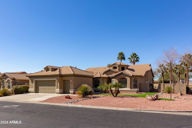 view of front of property with a garage