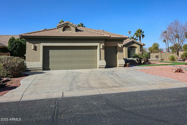 ranch-style house featuring a garage