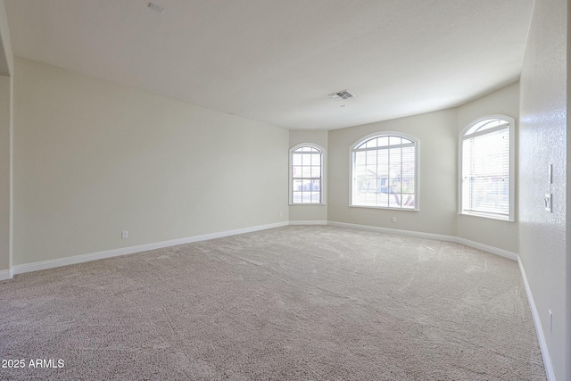 view of carpeted spare room