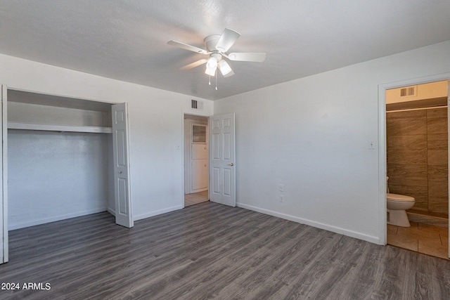 3115 N 55th Ave, Phoenix, AZ 85031 - unfurnished bedroom featuring dark wood-style floors, a closet, ceiling fan, and ensuite bathroom