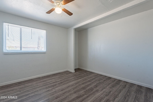 3115 N 55th Ave, Phoenix, AZ 85031 - spare room with dark wood-style floors and a ceiling fan