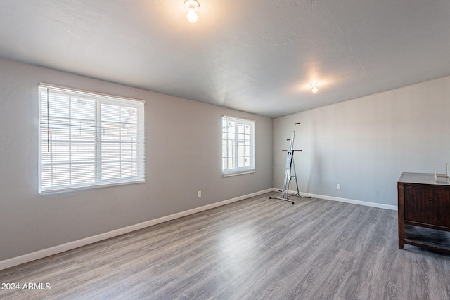 3115 N 55th Ave, Phoenix, AZ 85031 - exercise area featuring wood finished floors and baseboards