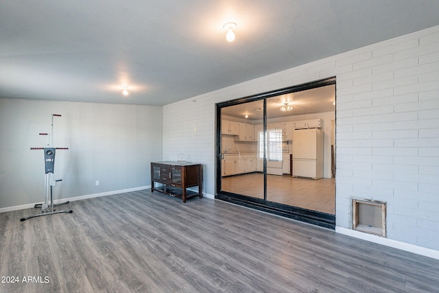 3115 N 55th Ave, Phoenix, AZ 85031 - empty room featuring wood finished floors and baseboards