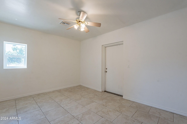 3115 N 55th Ave, Phoenix, AZ 85031 - empty room featuring ceiling fan and light tile patterned floors