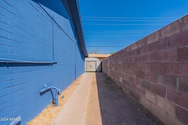 3115 N 55th Ave, Phoenix, AZ 85031 - view of home's exterior with a storage shed