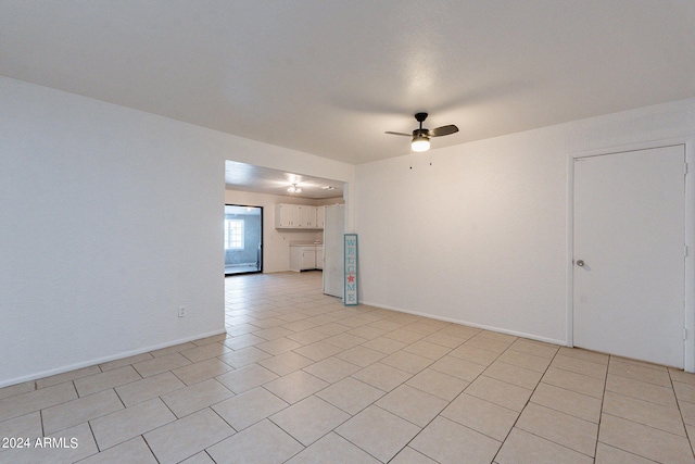 3115 N 55th Ave, Phoenix, AZ 85031 - unfurnished living room with a ceiling fan and light tile patterned floors