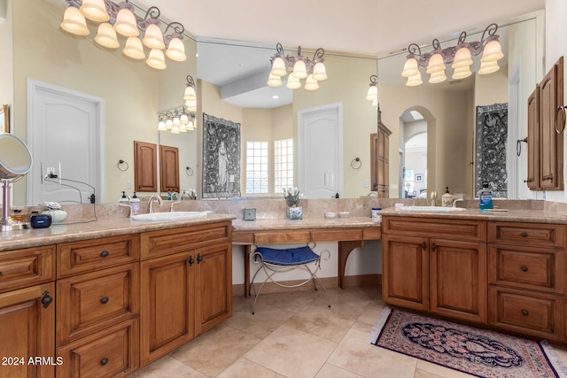 bathroom featuring tasteful backsplash, vanity, and tile patterned floors