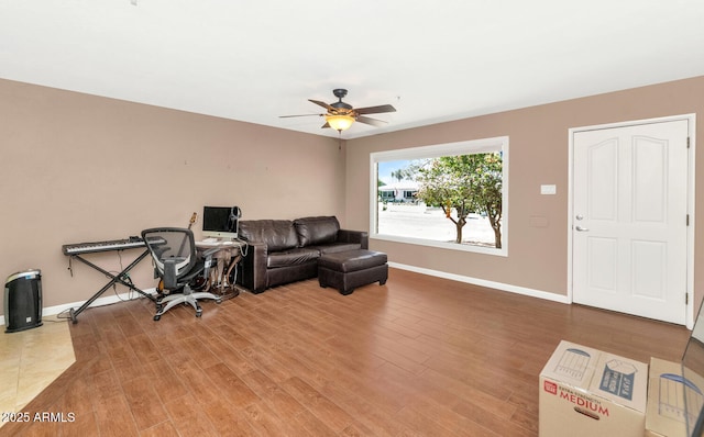 8140 E Mitchell Dr, Scottsdale, AZ 85251 - living area with a ceiling fan and wood finished floors