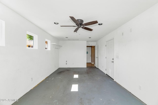 8140 E Mitchell Dr, Scottsdale, AZ 85251 - spare room with concrete floors and a ceiling fan