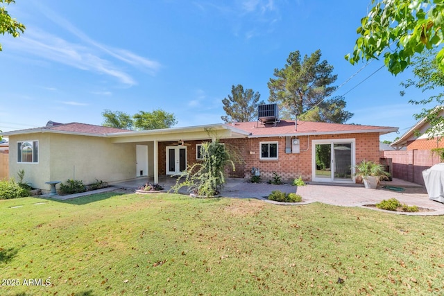 8140 E Mitchell Dr, Scottsdale, AZ 85251 - rear view of property featuring a patio area, french doors, brick siding, and ceiling fan