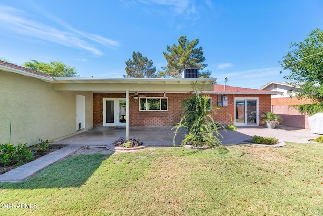 8140 E Mitchell Dr, Scottsdale, AZ 85251 - ranch-style home with french doors, a patio, a ceiling fan, and brick siding
