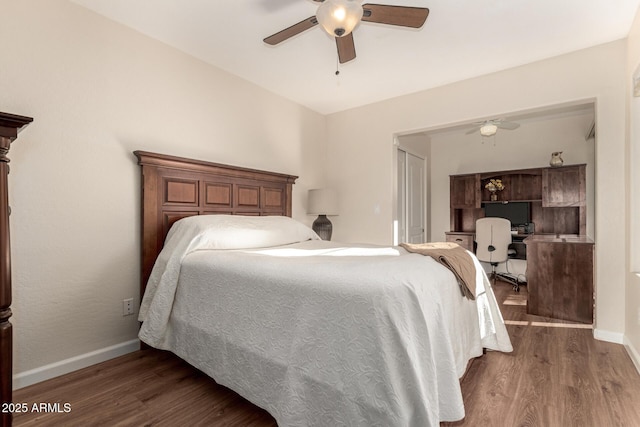 bedroom featuring ceiling fan and dark wood-type flooring