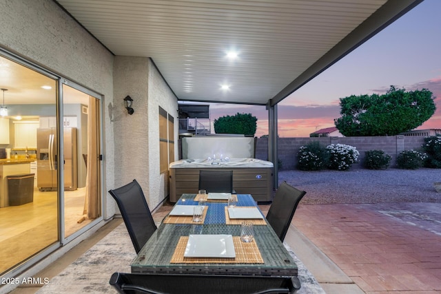 4049 E Arbor Ave, Mesa, AZ 85206 - fenced backyard with a patio area, a hot tub, and outdoor dining area