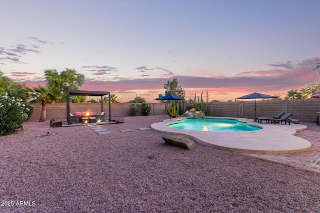 4049 E Arbor Ave, Mesa, AZ 85206 - pool at dusk featuring a gazebo, a patio area, and a fenced backyard