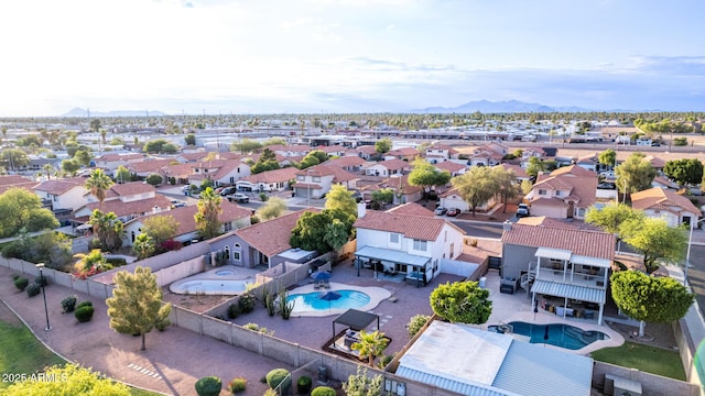 4049 E Arbor Ave, Mesa, AZ 85206 - aerial perspective of suburban area featuring a pool and a mountain backdrop