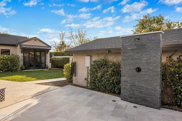 view of patio featuring french doors