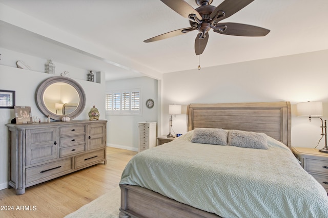 bedroom featuring ceiling fan and light hardwood / wood-style floors