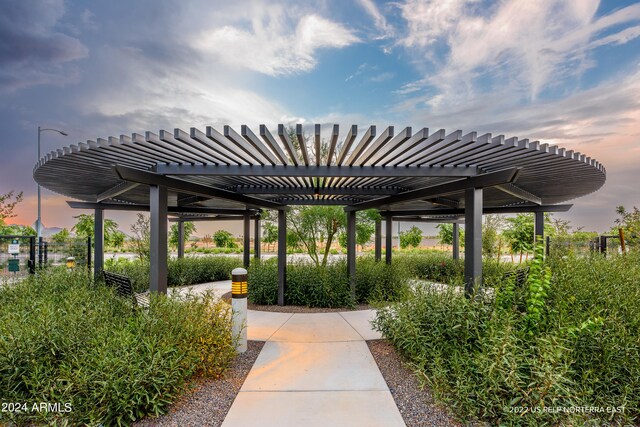 view of home's community with a pergola