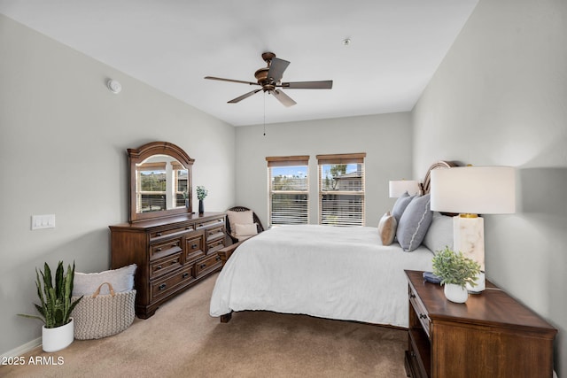 carpeted bedroom featuring a ceiling fan