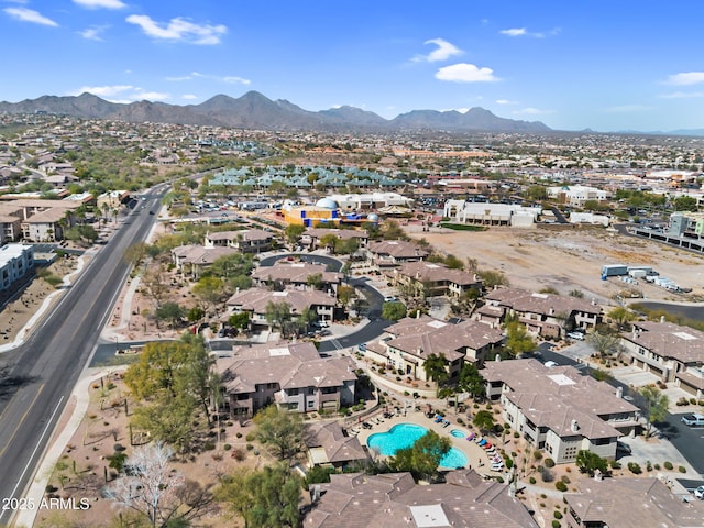 drone / aerial view featuring a residential view and a mountain view