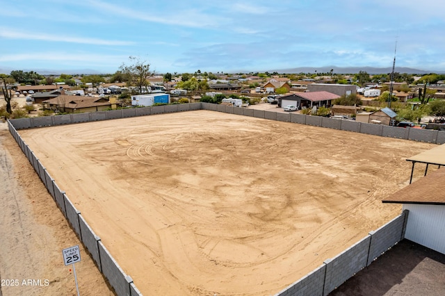 drone / aerial view with a mountain view and a residential view