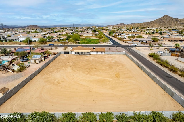 bird's eye view featuring a residential view and a mountain view