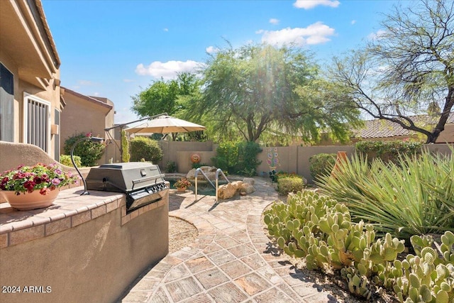 view of patio featuring grilling area