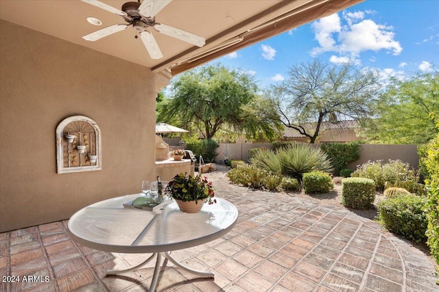 view of patio with ceiling fan