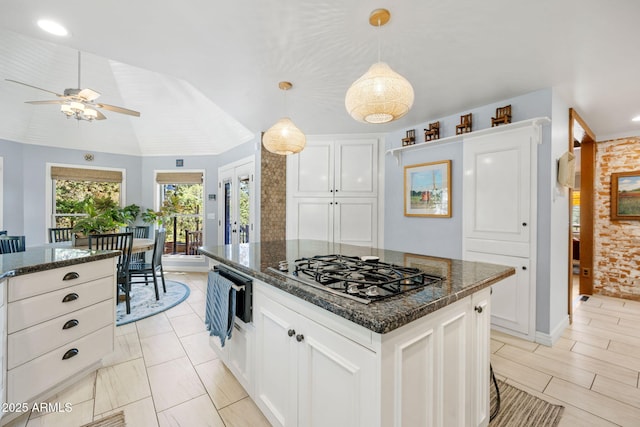 543 S Hassayampa Dr, Prescott, AZ 86303 - kitchen featuring gas cooktop, white cabinets, and a ceiling fan