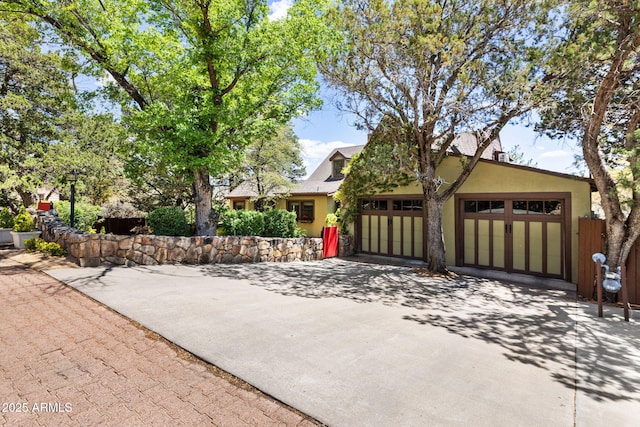 543 S Hassayampa Dr, Prescott, AZ 86303 - view of front of property featuring stucco siding, concrete driveway, and an attached garage