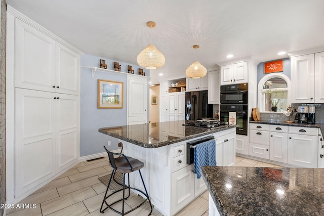 543 S Hassayampa Dr, Prescott, AZ 86303 - kitchen with black appliances, white cabinetry, a center island, decorative backsplash, and dark stone counters