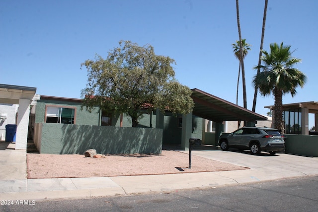 view of front of house with a carport