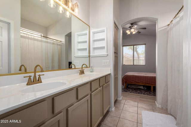 5401 S Dove Holw, Buckeye, AZ 85326 - bathroom with a ceiling fan, tile patterned floors, and double vanity
