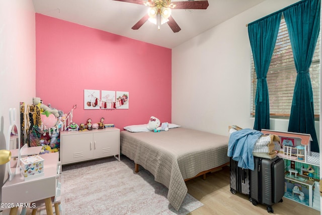 5401 S Dove Holw, Buckeye, AZ 85326 - bedroom with wood finished floors and a ceiling fan