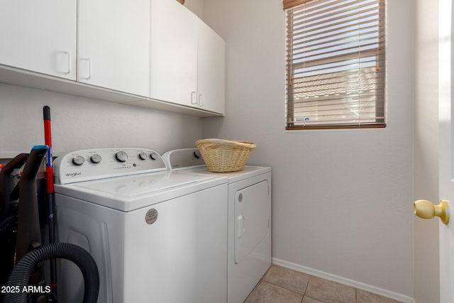 5401 S Dove Holw, Buckeye, AZ 85326 - washroom featuring washer and dryer, cabinet space, baseboards, and light tile patterned flooring
